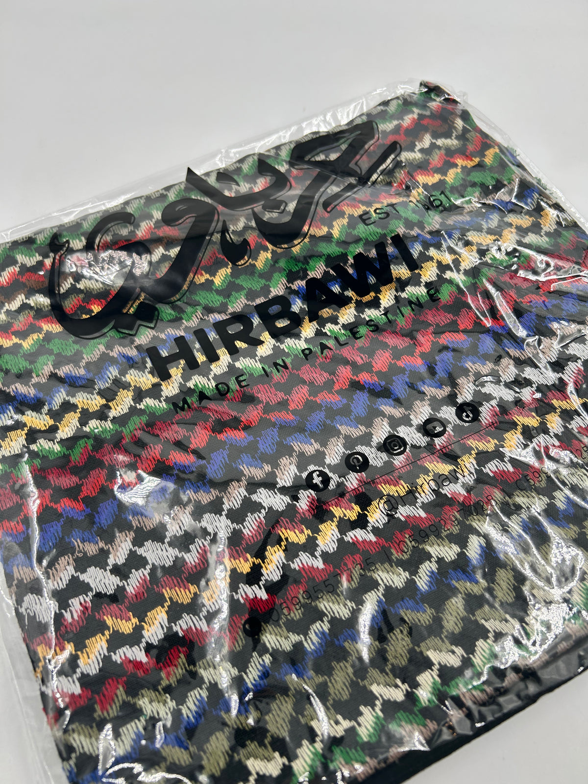 Authentic Hirbawi kuffiyeh - multi-colored with green tassel